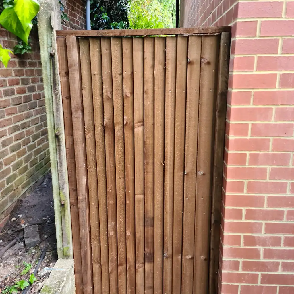 Made-to-measure timber garden gate with braced frame and galvanised ironmongery fitted by Bracknell Fencing LTD in Berkshire