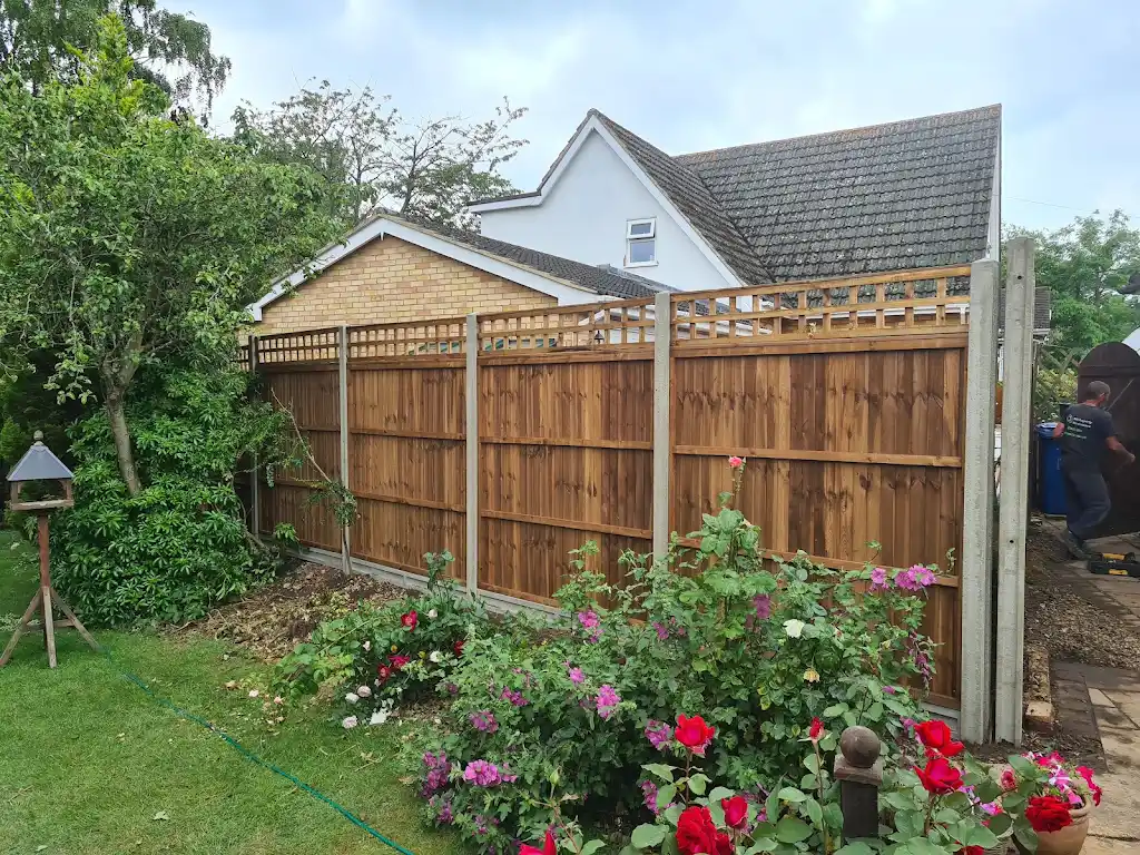 Closeboard featheredge fence panel installed with concrete posts and gravel boards by Bracknell Fencing LTD in Berkshire