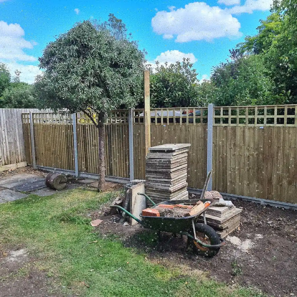 Closeboard featheredge fence panel installed with concrete posts and gravel boards by Bracknell Fencing LTD in Berkshire