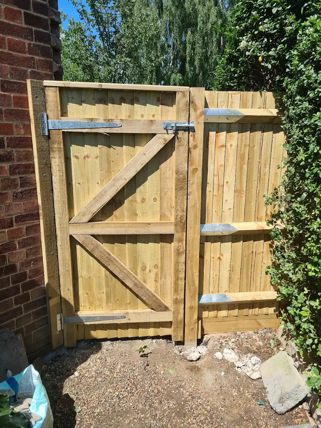 Made-to-measure timber garden gate with braced frame and galvanised ironmongery fitted by Bracknell Fencing LTD in Berkshire