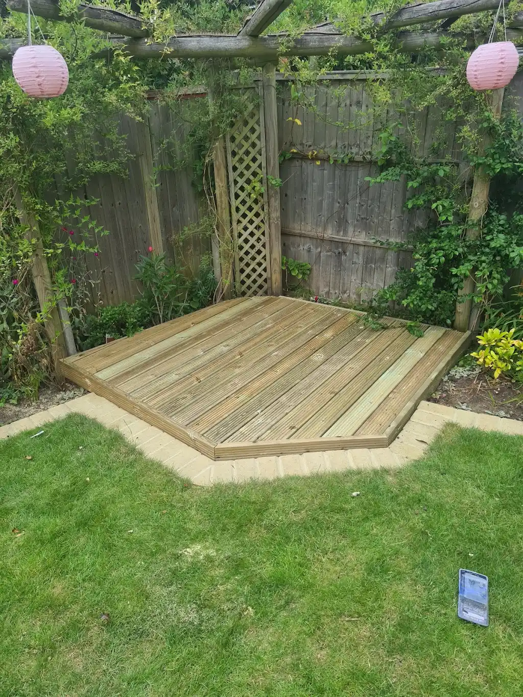 Timber garden decking built and installed by Bracknell Fencing LTD in Berkshire