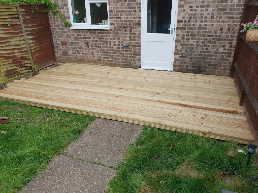Timber garden decking built and installed by Bracknell Fencing LTD in Berkshire