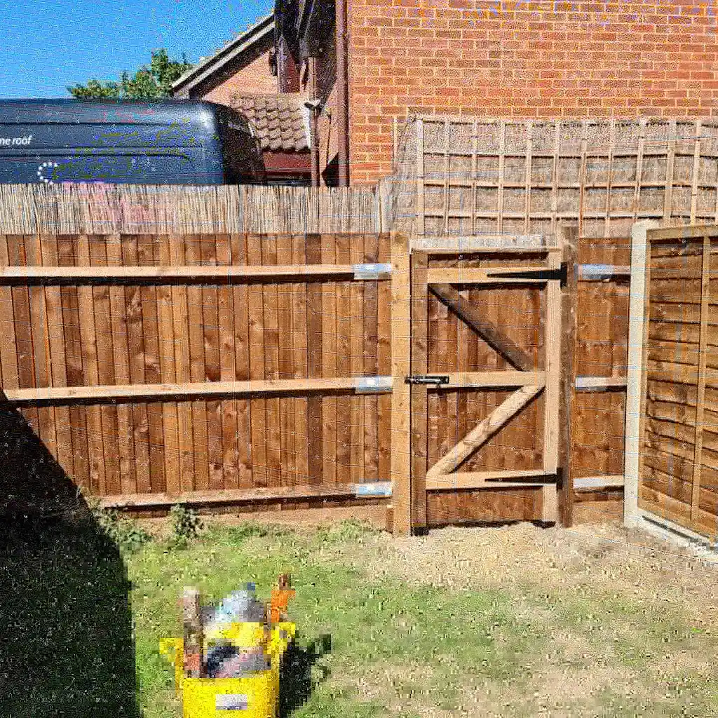 Made-to-measure timber garden gate with braced frame and galvanised ironmongery fitted by Bracknell Fencing LTD in Berkshire