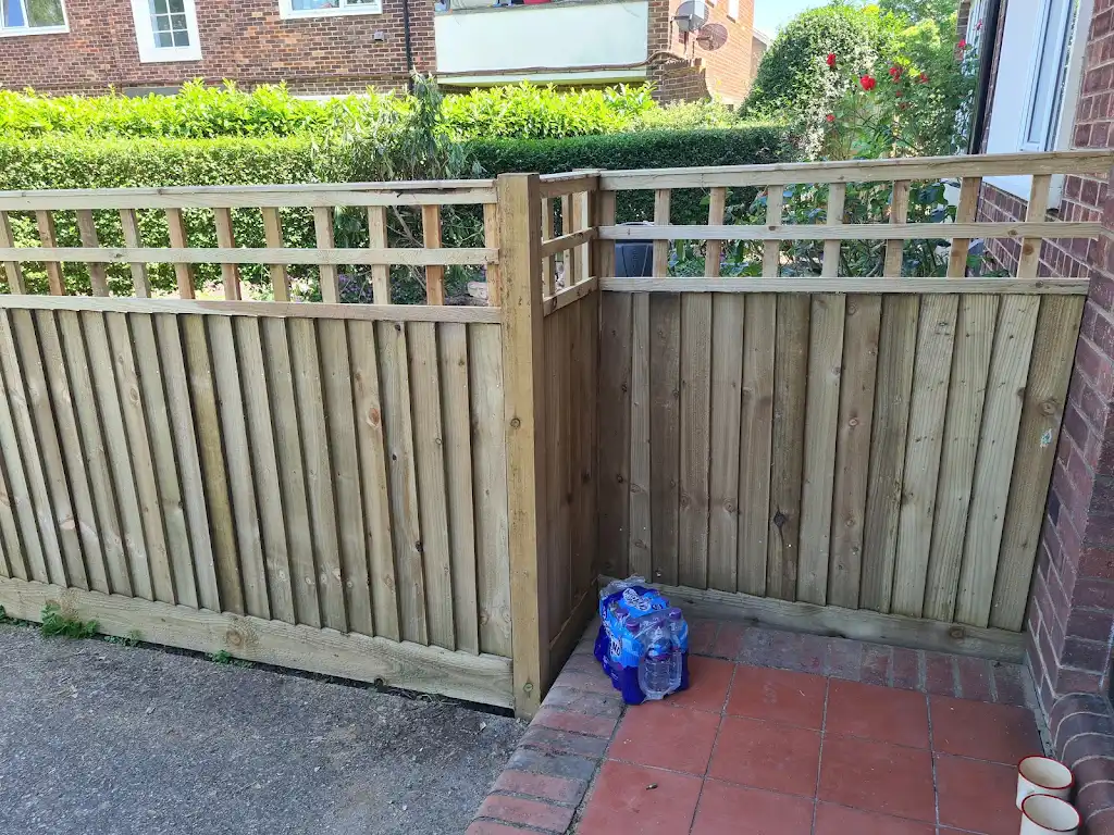Closeboard featheredge fence panel installed with concrete posts and gravel boards by Bracknell Fencing LTD in Berkshire